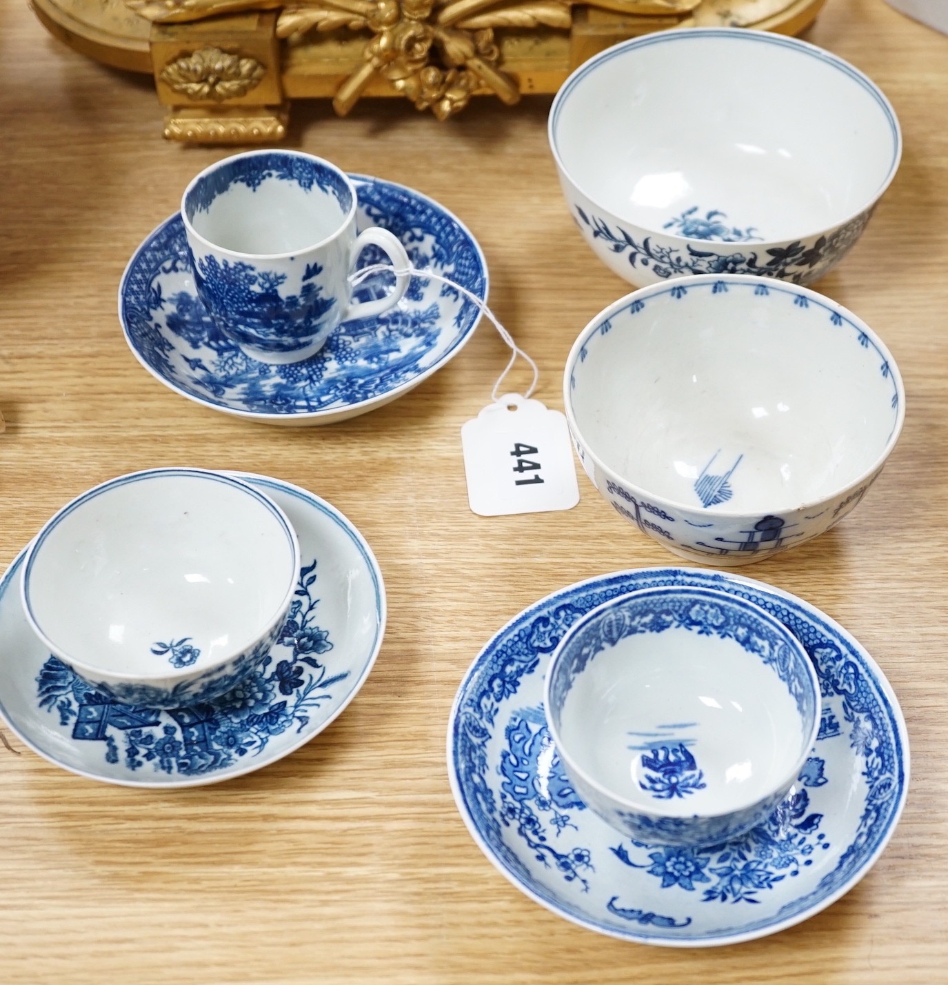 A Worcester teabowl and saucer printed with the Bat pattern, a coffee cup and saucer with the Argument pattern, another with the Fence pattern and a similar bowl and a very interesting pearlware bowl